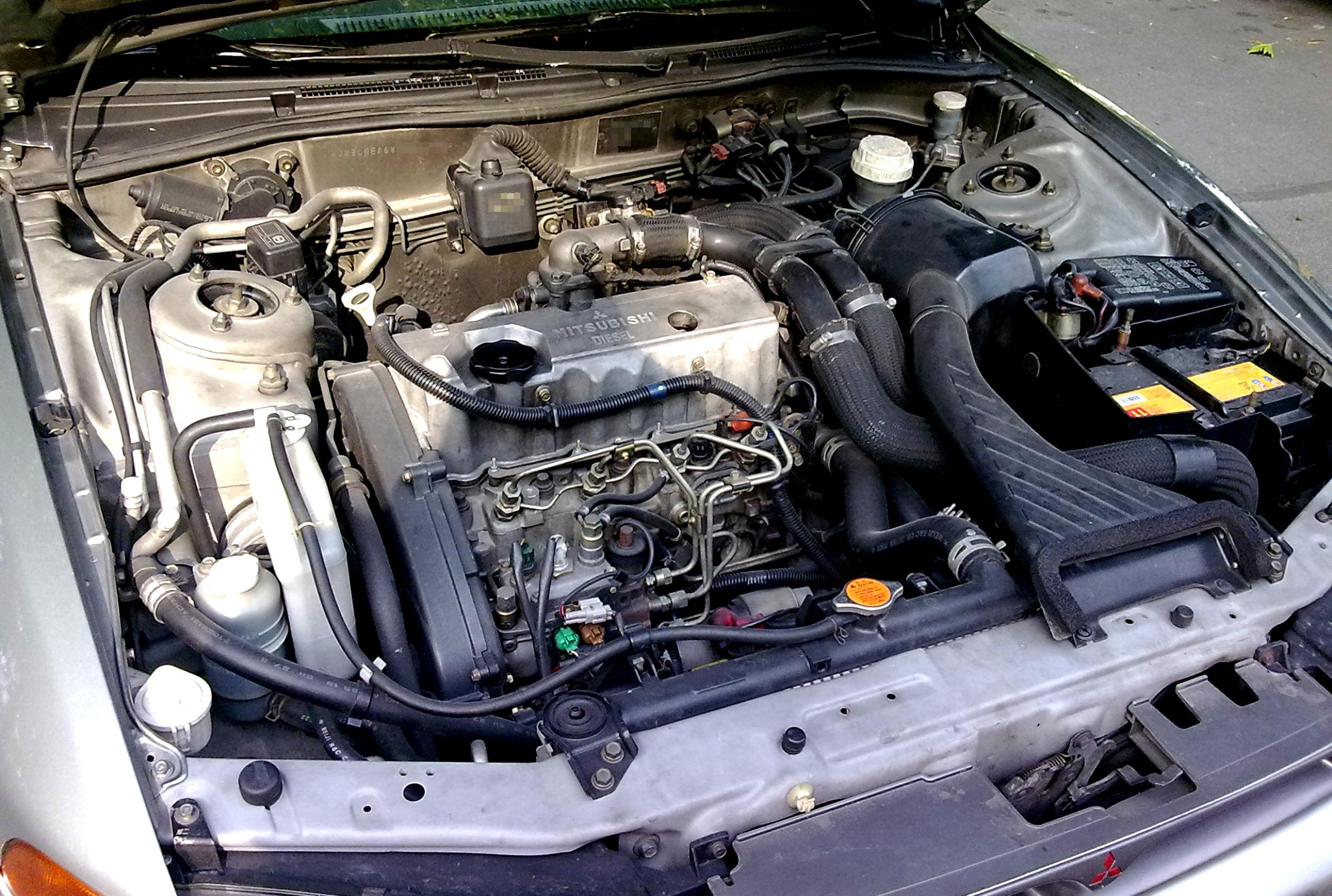 Двигатель мицубиси галант. Galant Mitsubishi 1997 двигатель. Галант 8 мотор. Митсубиси Галант 8 2.4 мотор. Двигатель Митсубиси Галант 2.0.